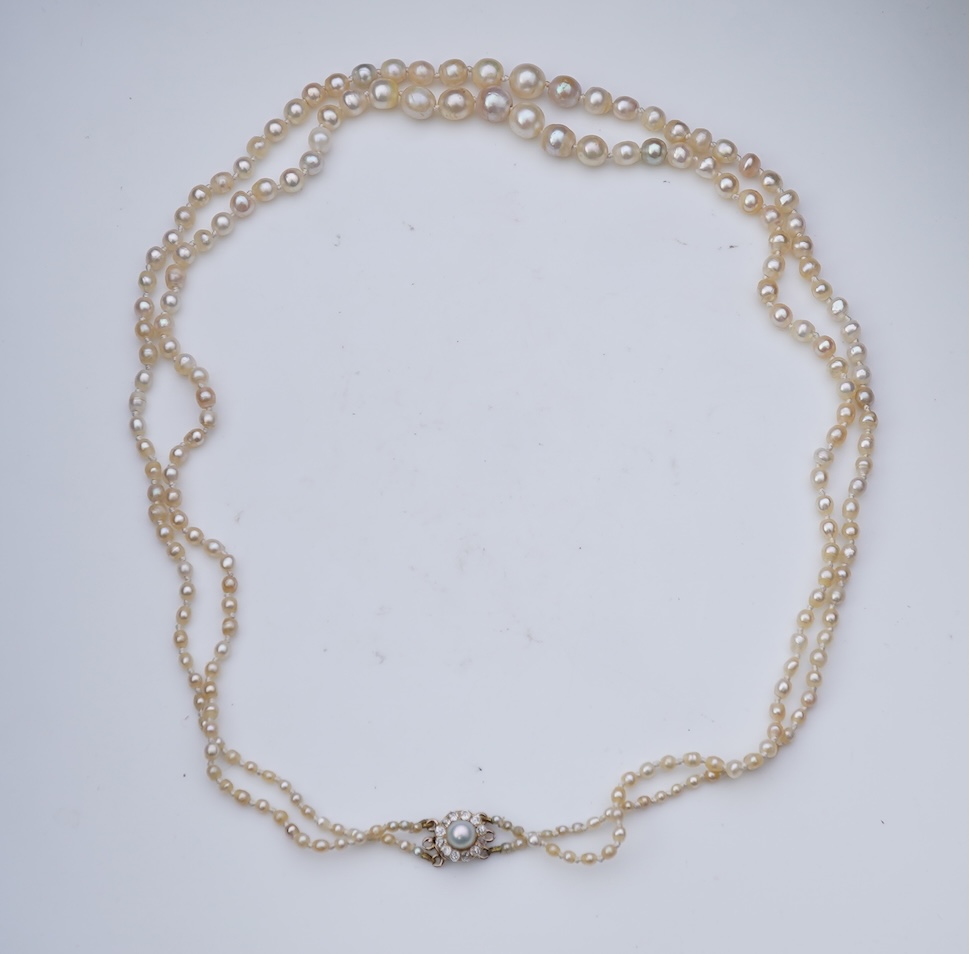 A natural pearl and diamond necklace, early 20th century